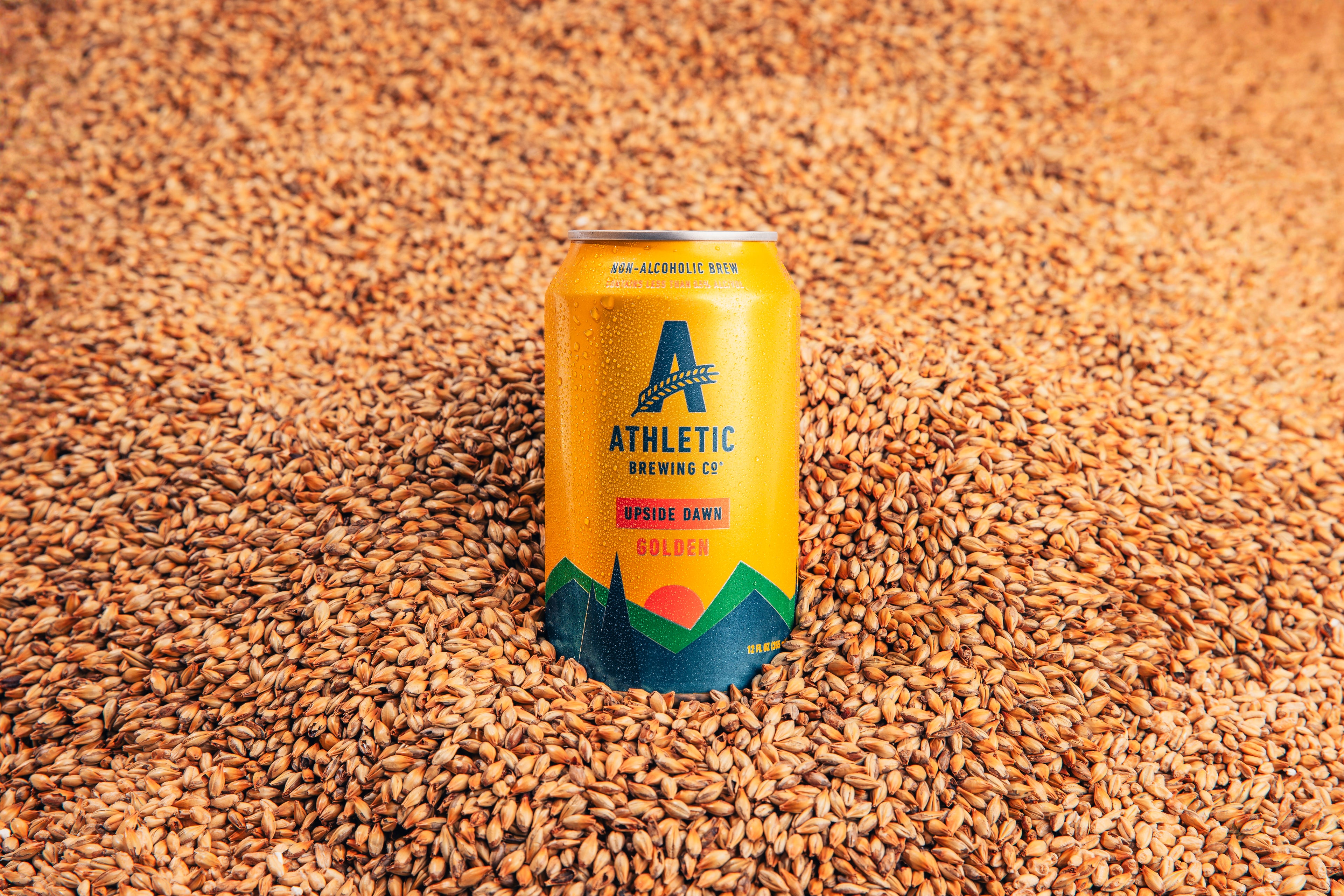 Can of Upside Dawn sticking out of grain